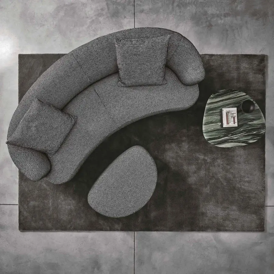 Elegant Porada Yves sofa upholstered in muted gray heathered textile with solid Canaletto walnut feet