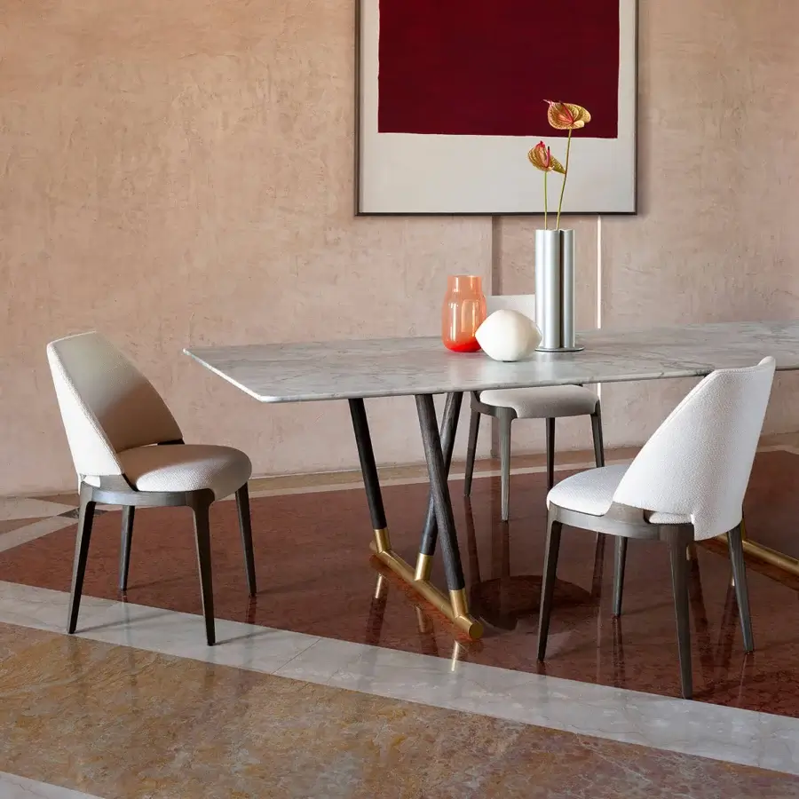 Superior Potocco Velis Hug chair upholstered in light neutral textile with a sleek dark satin-finish metal frame