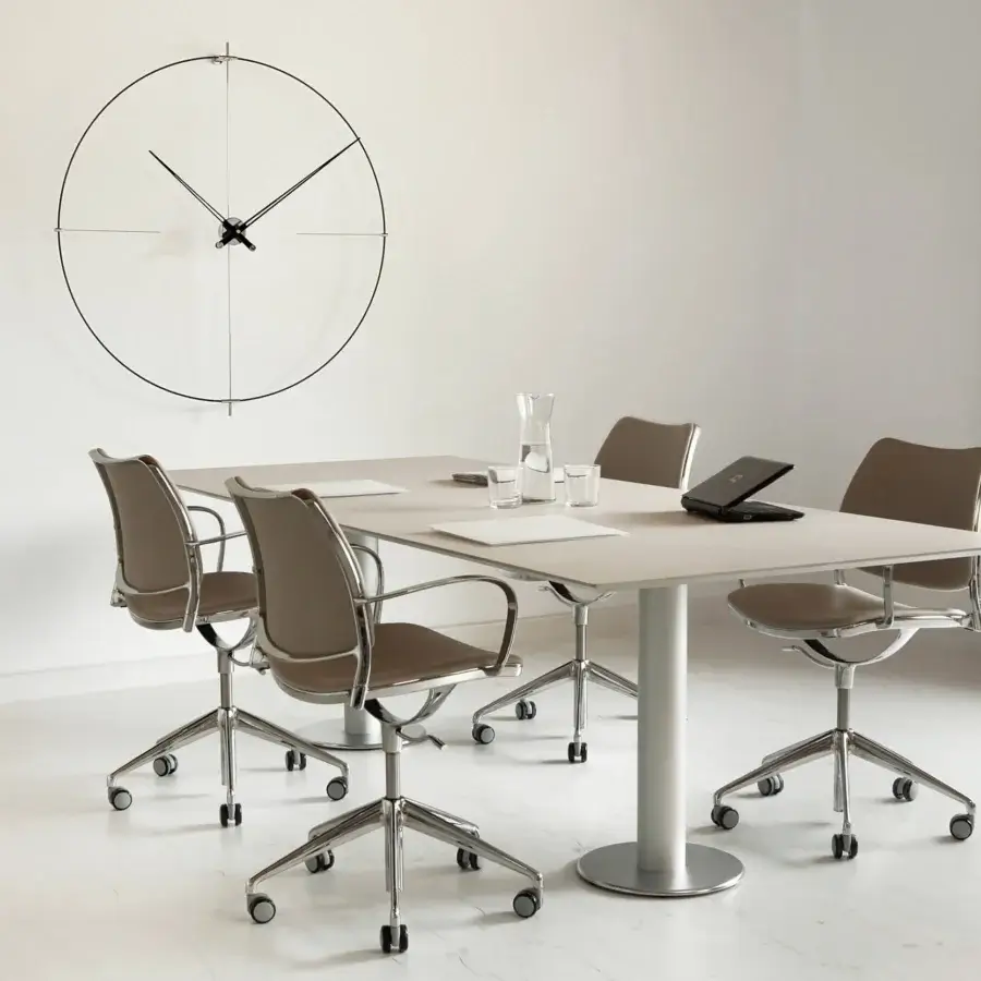 Distinguished Nomon Bilbao wall clock with a fiberglass ring, warm walnut hands and matte black finish