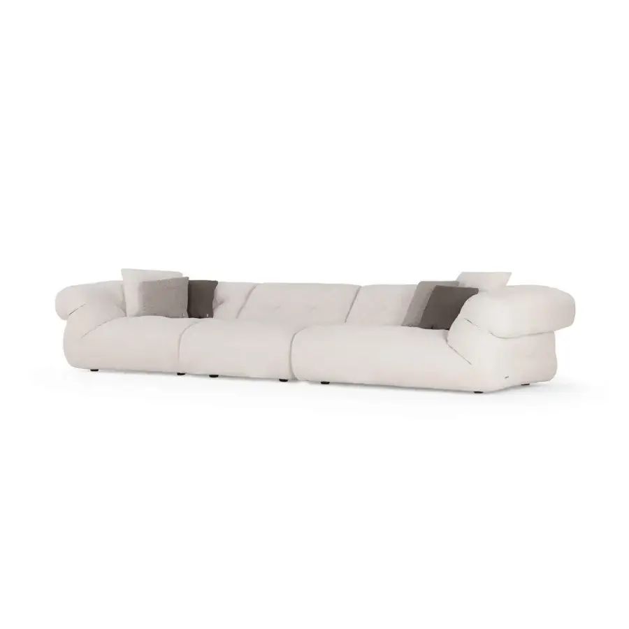 Distinguished Visionnaire Walker sofa upholstered in off-white textured fabric with a thick goose down quilt and curved armrests