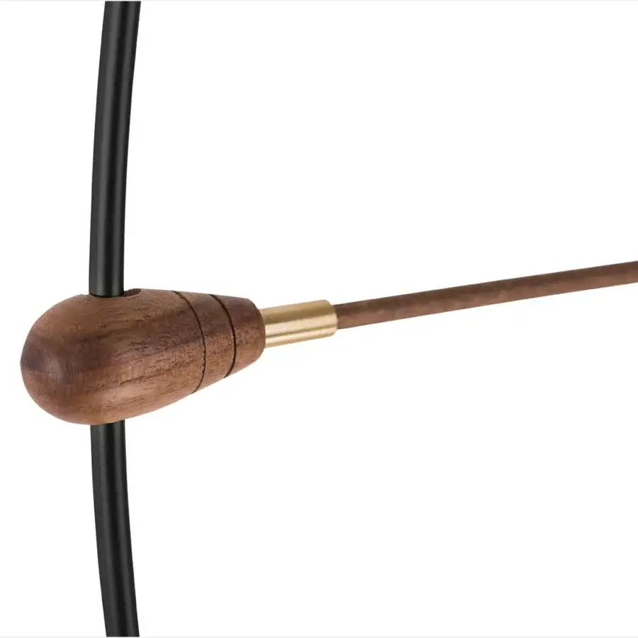 Elegant Nomon Bilbao Premium wall clock crafted with a warm brass fiberglass ring and medium-brown oak fibers with a satin finish