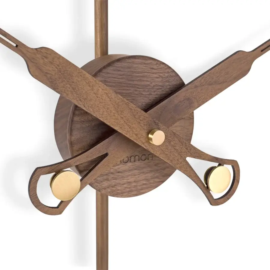 Superior Nomon Bilbao Premium wall clock crafted in wood with brass fiberglass and a satin finish