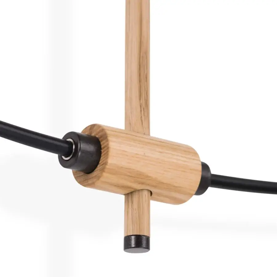 Superior Nomon Mini Bilbao Premium wall clock crafted with wood, fiberglass and walnut with a satin finish
