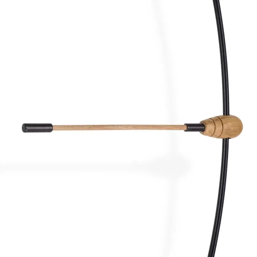 Elegant Nomon Mini Bilbao Premium wall clock in light wood with a sleek black fiberglass frame and satin finish