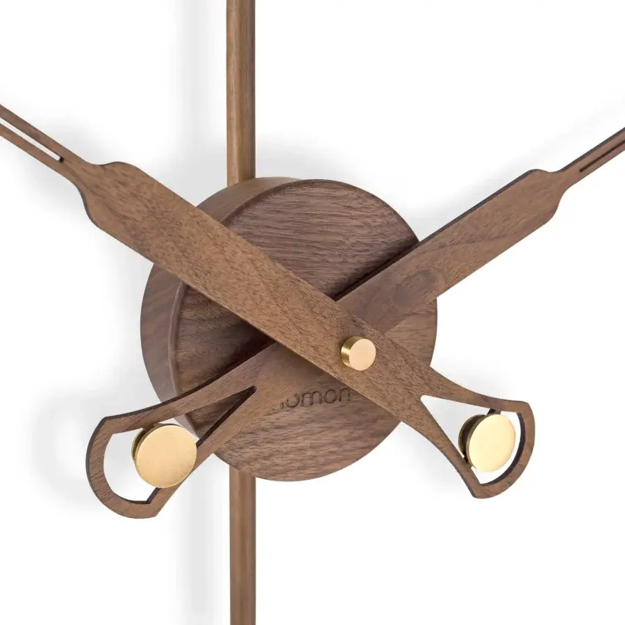 Distinguished Nomon Mini Bilbao Premium wall clock crafted with wood, bronze metal hands and a fiberglass ring with satin finish