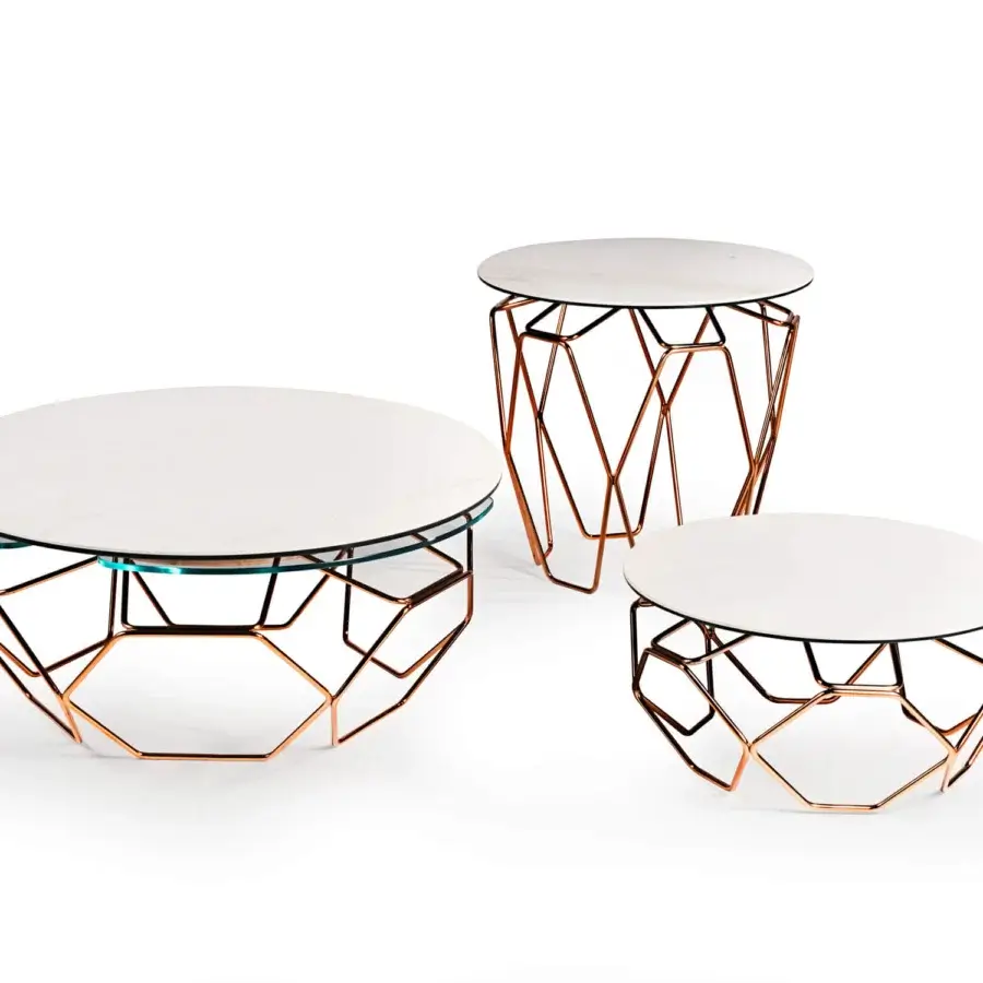 Superior Naos Hive coffee table crafted with glossy white ceramic and glass exhibiting a rose-gold geometric base