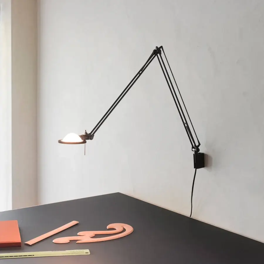 Superior Luceplan Berenice wall lamp crafted in metal with a matte black finish delivers directed light with fluid positioning