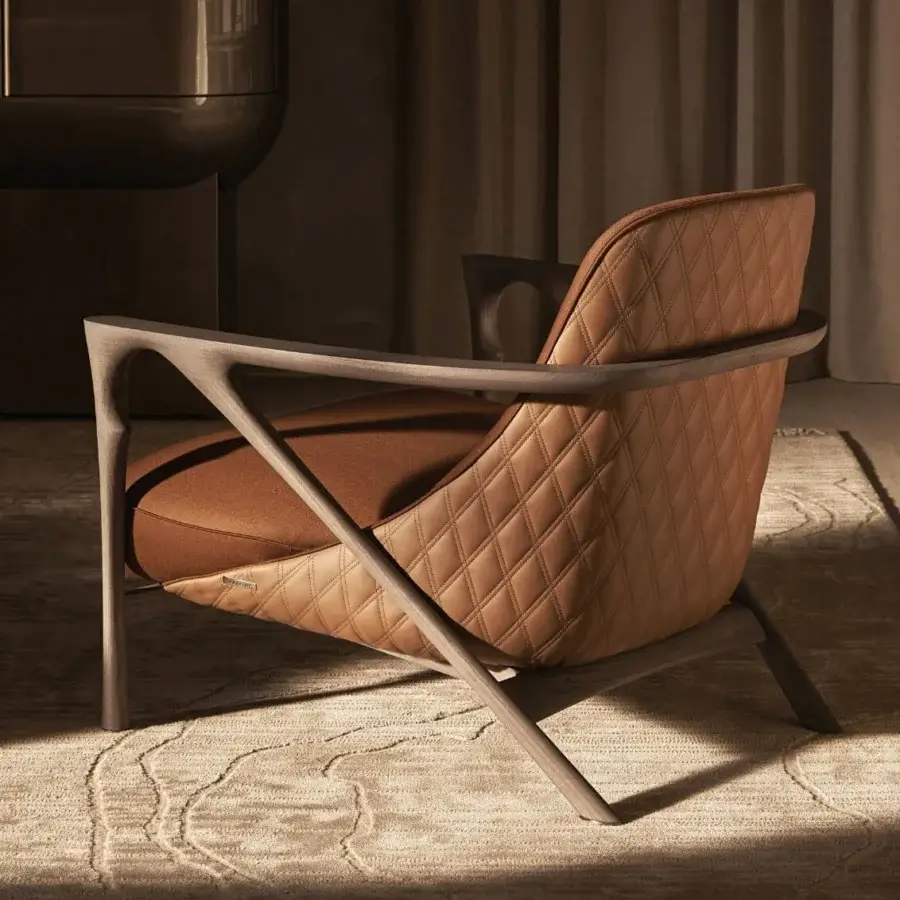 Lavish Visionnaire Alya lounge chair with sculpted solid ash wood, satin finish and medium brown quilted upholstery