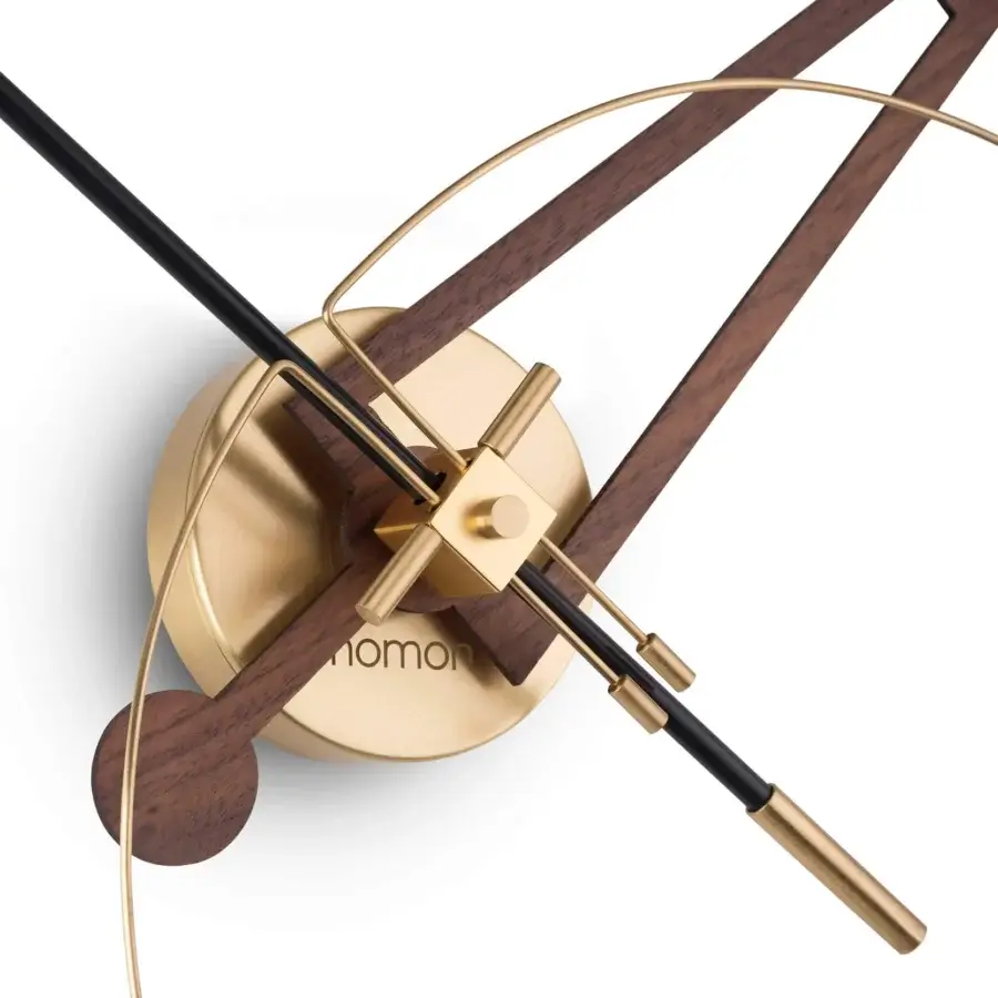 Superior Nomon Cris wall clock crafted in dark brown wood with a brushed metallic face and striking wooden hands