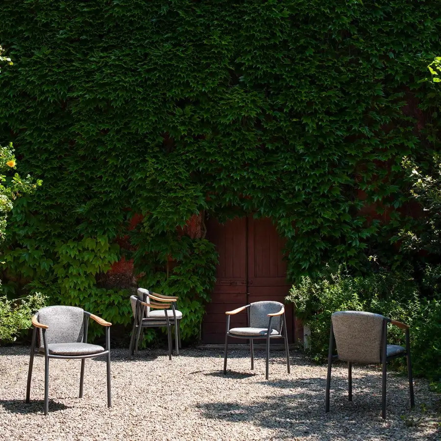 Distinguished Potocco Solar armchair with neutral gray technical fabric, crafted with powder-coated aluminum and warm solid teak armrests