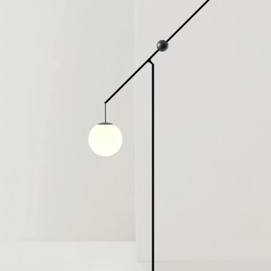 Elegant Luceplan Malamata floor lamp in matte black metal with a frosted glass diffuser and innovative adjustment system