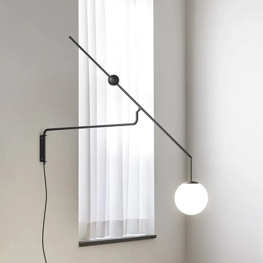 Exceptional Luceplan Malamata wall lamp with a matte black metal finish and opaque white blown-glass diffuser for expressive illumination