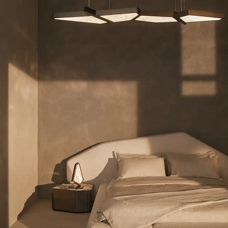 Distinguished Visionnaire Neolito bed with an asymmetrical headboard upholstered in warm beige designer fabric and a multilayer wood frame