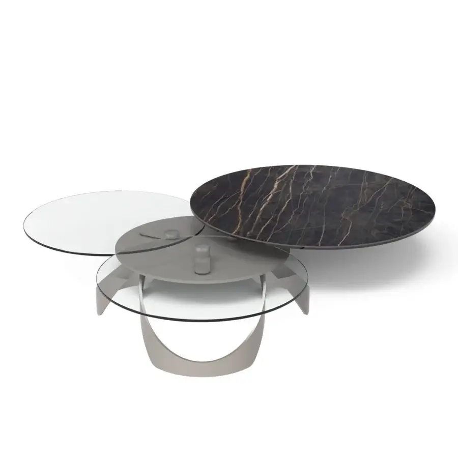 Distinctive Naos Avior coffee table with rotating ceramic tops and a painted steel base offering sculptural form