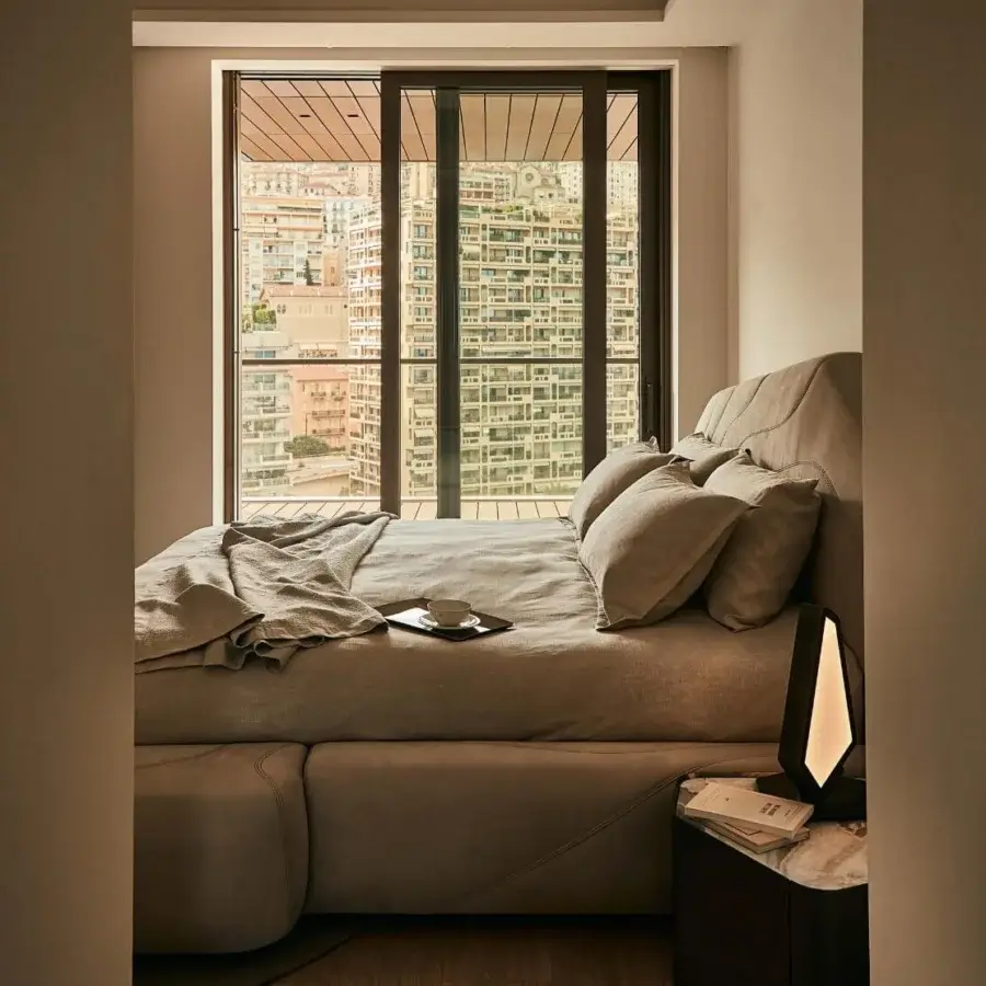 Exceptional Visionnaire Neolito Bold bed upholstered in neutral beige leather with smooth matte finish and quilted asymmetrical headboard
