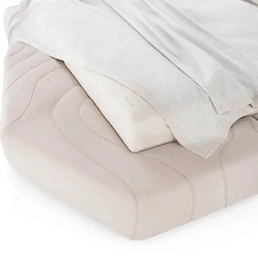Exceptional Visionnaire Neolito Bold bed crafted in blush leather with decorative quilting and smooth matte finish