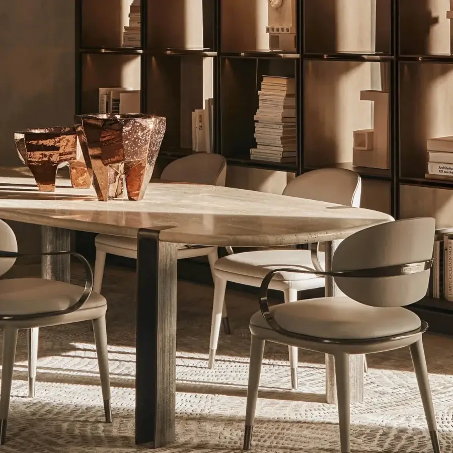 Distinguished Visionnaire Mystic table with Dover White marble top and hand-textured cast aluminum legs displaying a matte finish