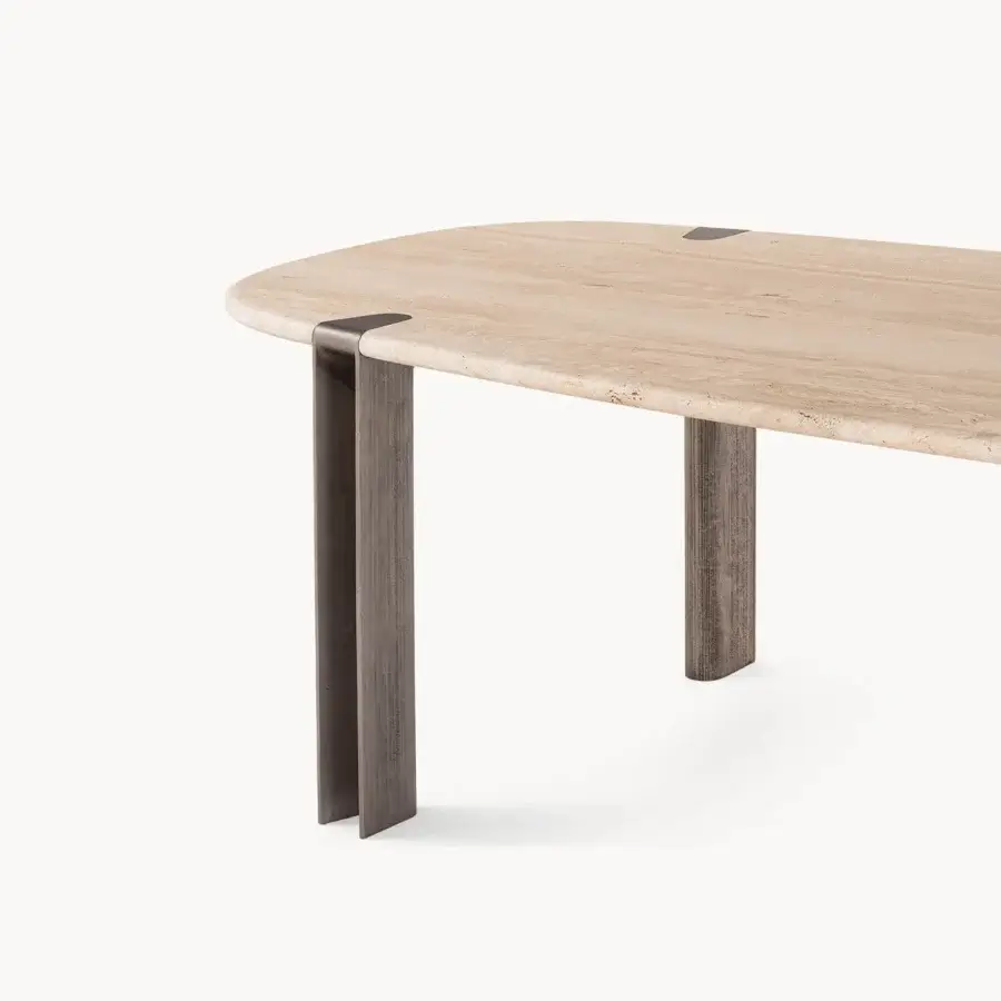 Exceptional Visionnaire Mystic table with warm beige travertine surface and hand-textured cast aluminum legs in matte open-pore finish