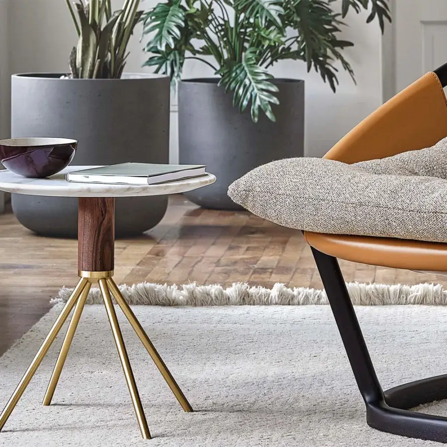 Exceptional Porada Jelly coffee side table with white Carrara marble and brushed brass supporting a canaletto walnut cylinder base