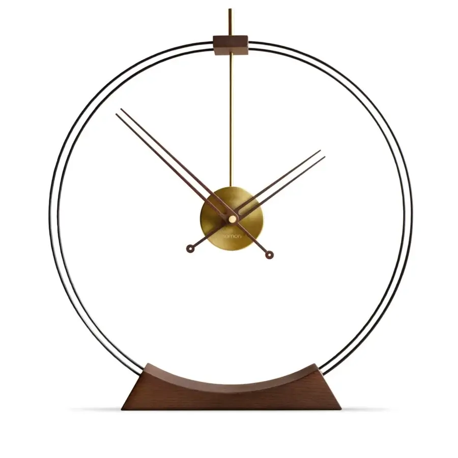 Superior Nomon Aire table clock in warm walnut wood with polished brass details and fluid geometry