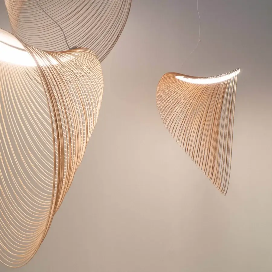 Exceptional Luceplan Illan suspension lamp in warm light-brown flexible plywood with a satin finish