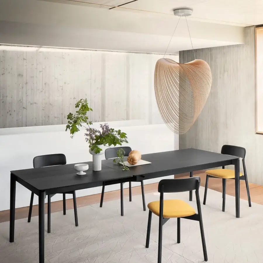 Elegant Luceplan Illan suspension lamp with heart-shaped silhouette in warm pale beige laser-cut flexible plywood construction