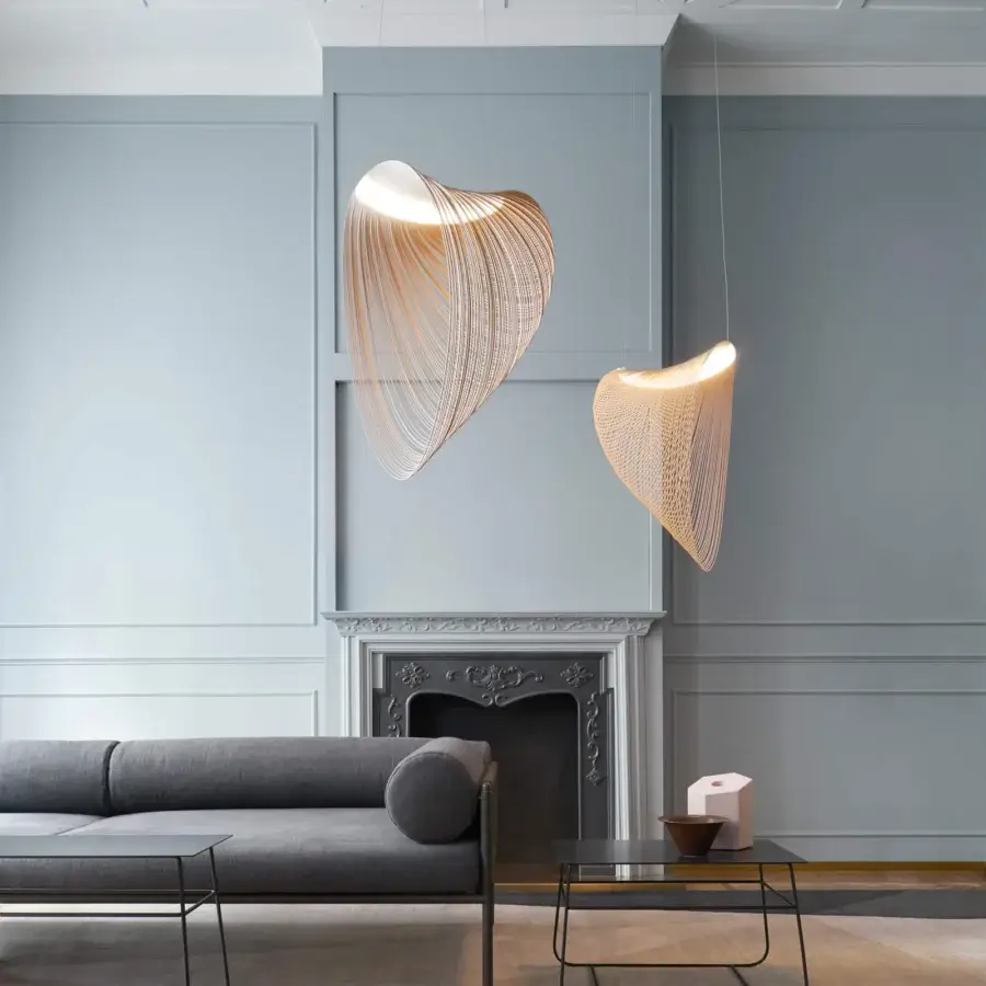 Superior Luceplan Illan suspension lamp with flowing ovoid form crafted from warm light-brown laser-cut flexible plywood and satin finish
