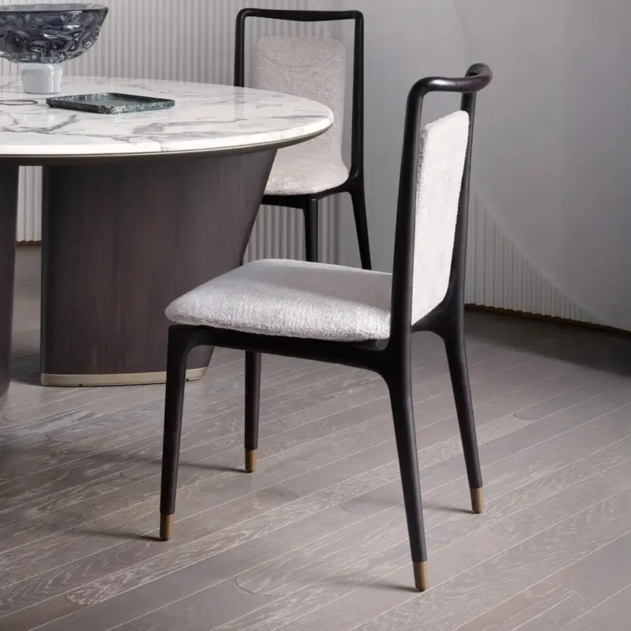 Graceful Giorgetti Ibla chair sculpted from solid ash wood with dark matte finish and light gray textured textile upholstery