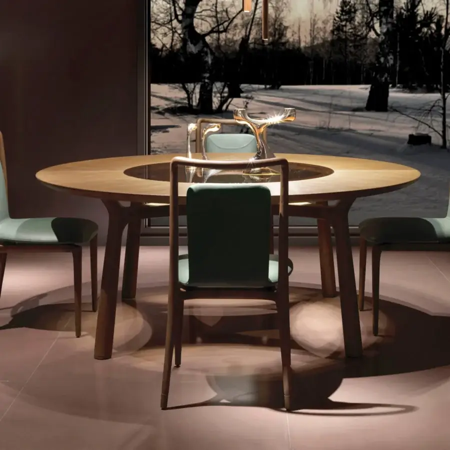 Captivating Giorgetti Ibla chair crafted from solid ash wood with teal-green textile upholstery and a satin sheen