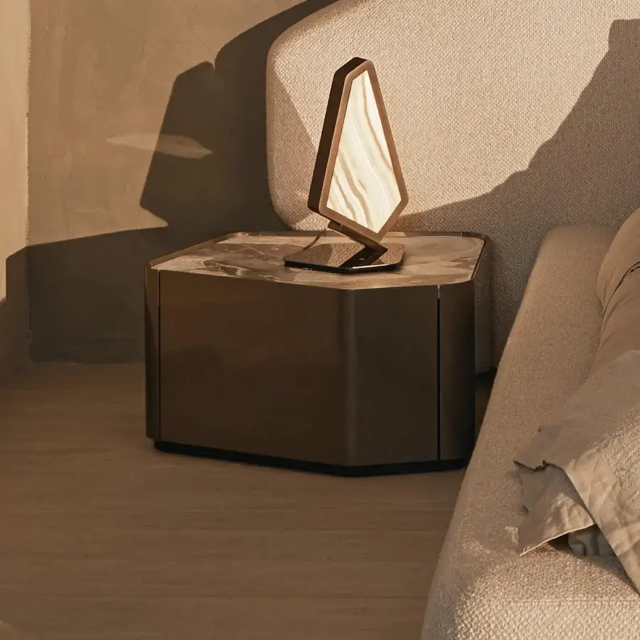 Distinguished Visionnaire Neolito nightstand with angled form and unique “leather”-finish marble top in warm brown metallic lacquer