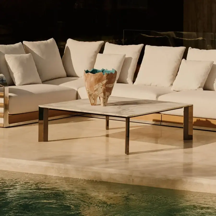 Distinguished Visionnaire Vixen coffee table with polished marble and dark satin aluminum built with inclined stainless steel legs