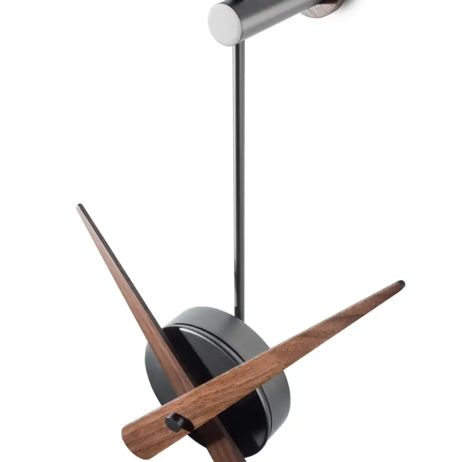Distinguished Nomon Punto y Coma clock crafted in warm brown wood with a matte black face and dark gray metal support
