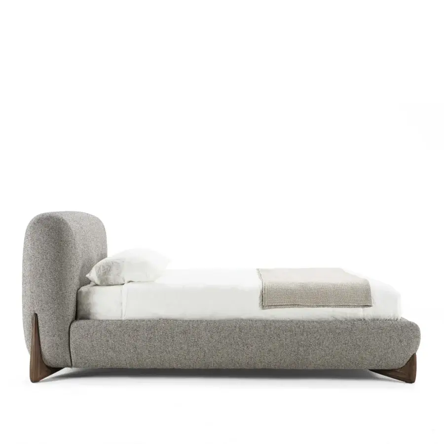 Elegant Softbay Bed Max bed with neutral gray textured textile upholstery and canaletto walnut wrapping base with smooth dark finish