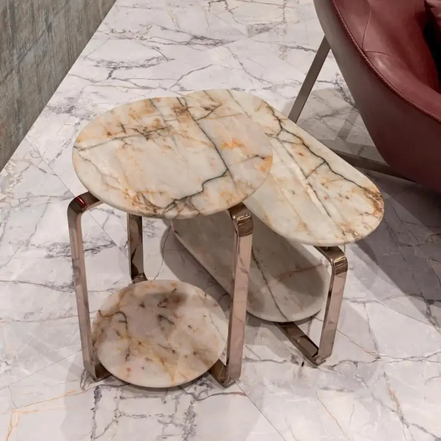 Exceptional Visionnaire Button coffee and side table with double hand-polished marble tops and satin stainless steel curved supports