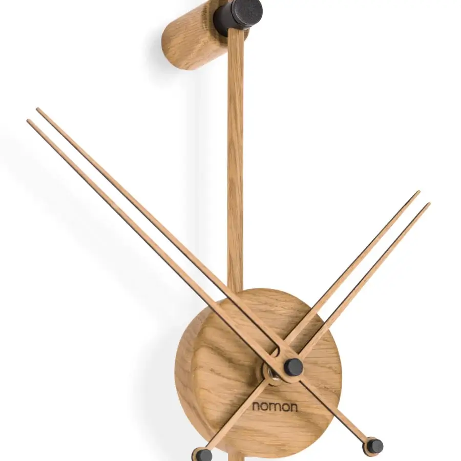 Exclusive Nomon Punto y Coma Premium clock in walnut wood with brass details and a satin finish