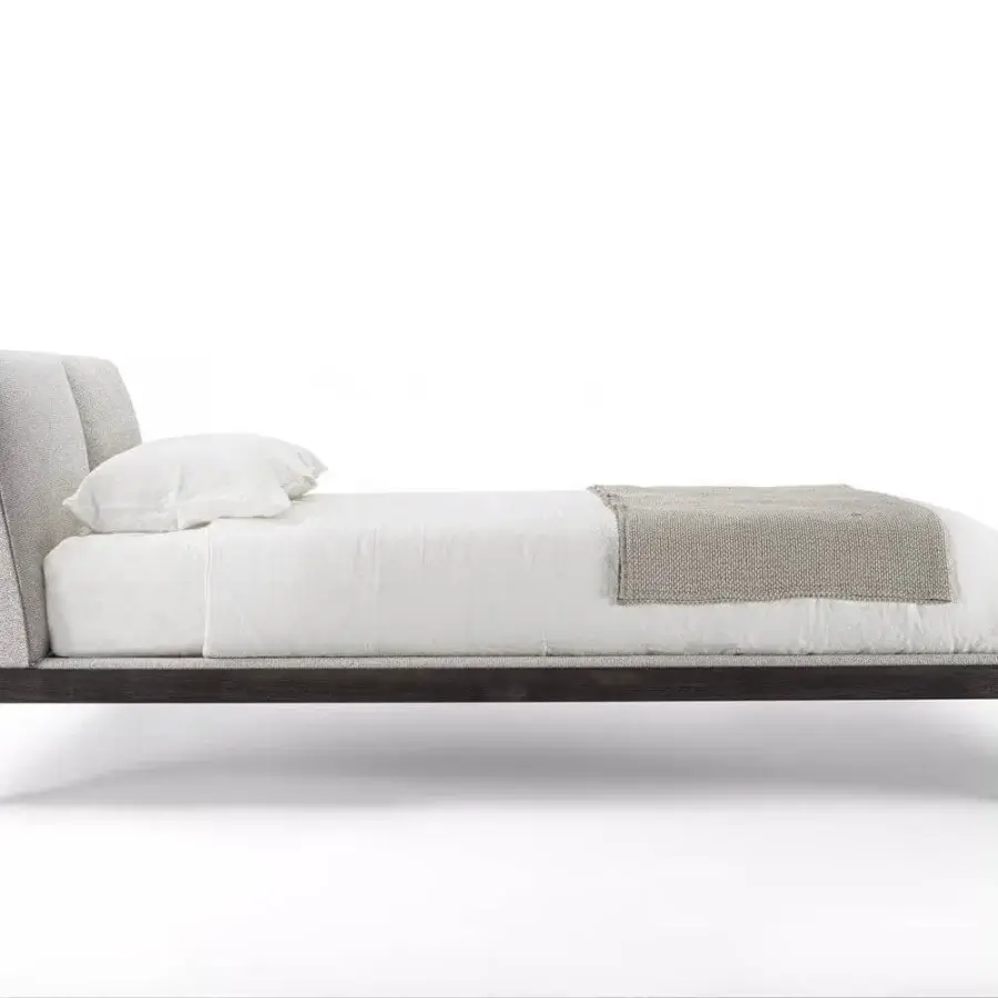Distinguished Porada Ziggy Bed Soft with a solid canaletto walnut frame and neutral beige-grey textured weave upholstery in a dark satin finish