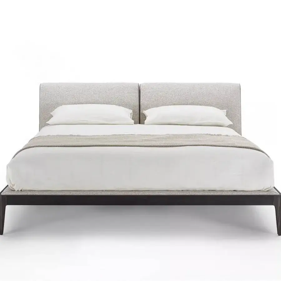 Distinguished Porada Ziggy Bed Soft with a solid canaletto walnut frame and light grey textured fabric upholstery offering inviting comfort