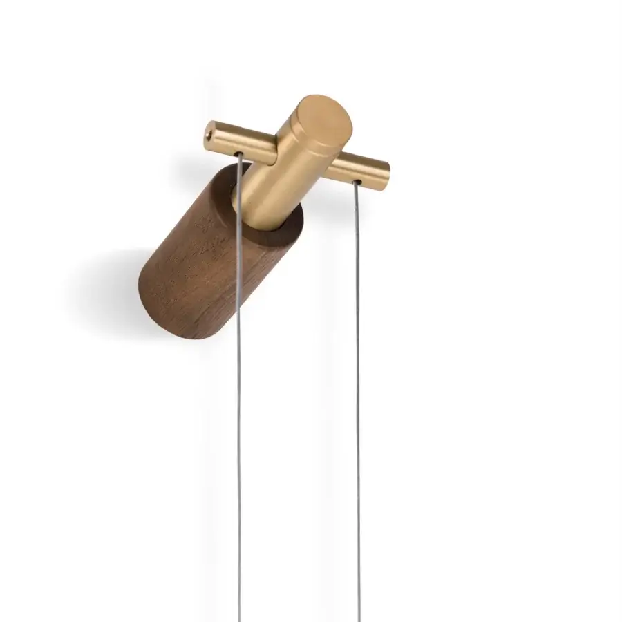 Superior Nomon Péndulo Premium pendulum clock crafted in medium wood with polished brass-toned metal and satin finish