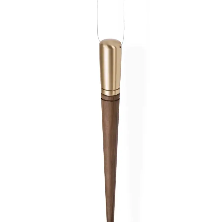 Distinguished Nomon Péndulo Premium pendulum clock with satin gold-toned metal housing and smooth medium-brown wood finish