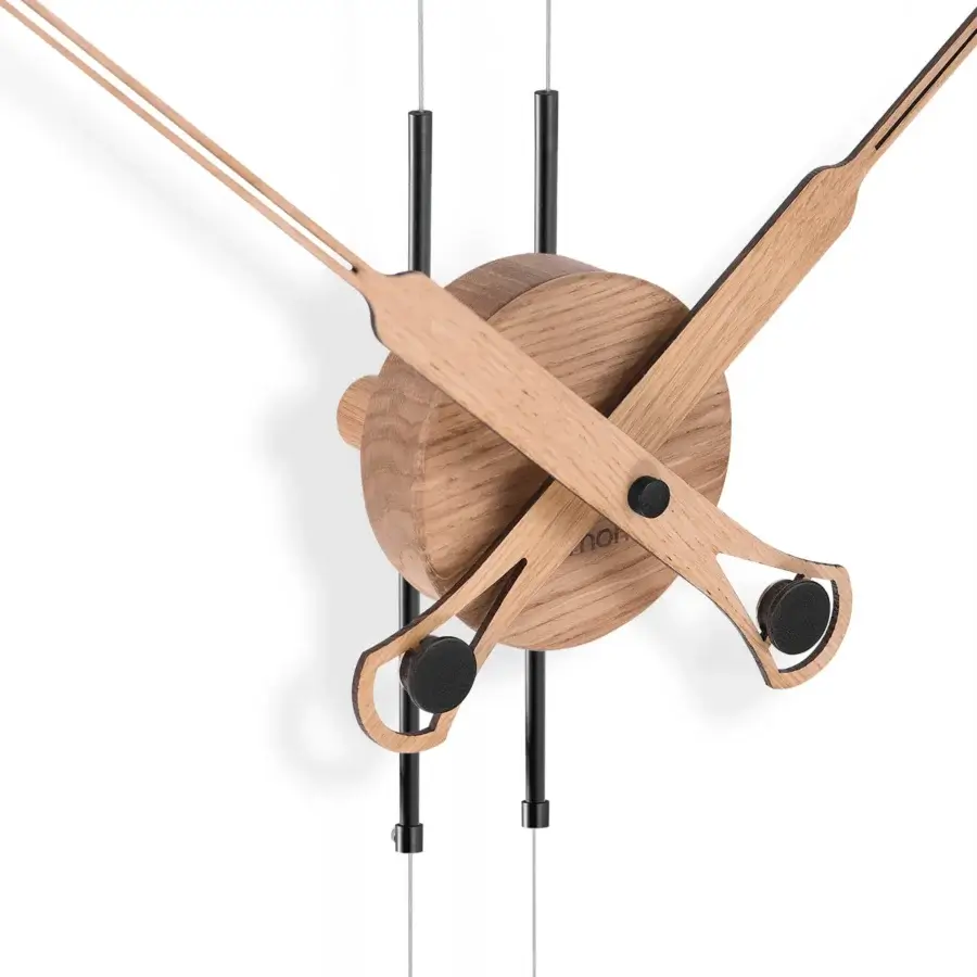 Distinguished Nomon Péndulo Premium pendulum clock crafted in light brown wood with smooth satin finish