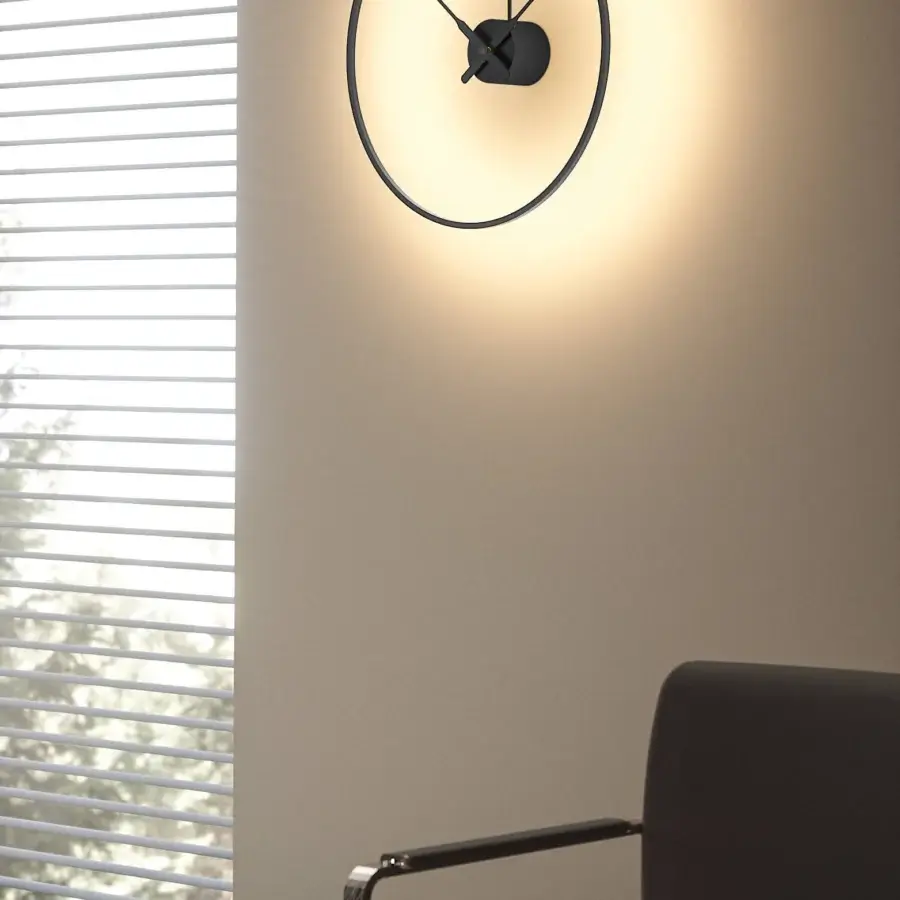 Elegant Nomon Ombra clock lamp built in black anodized aluminum with a matte finish for refined illumination