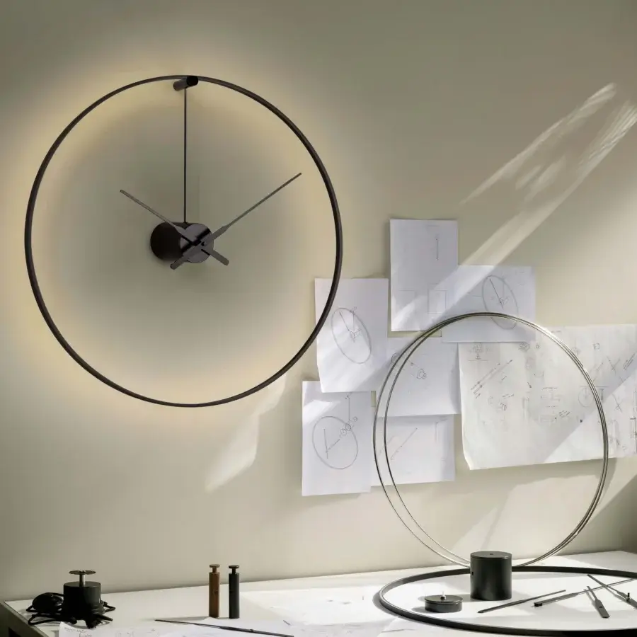 Superior Nomon Ombra clock lamp crafted in black anodized aluminum with a smooth matte finish