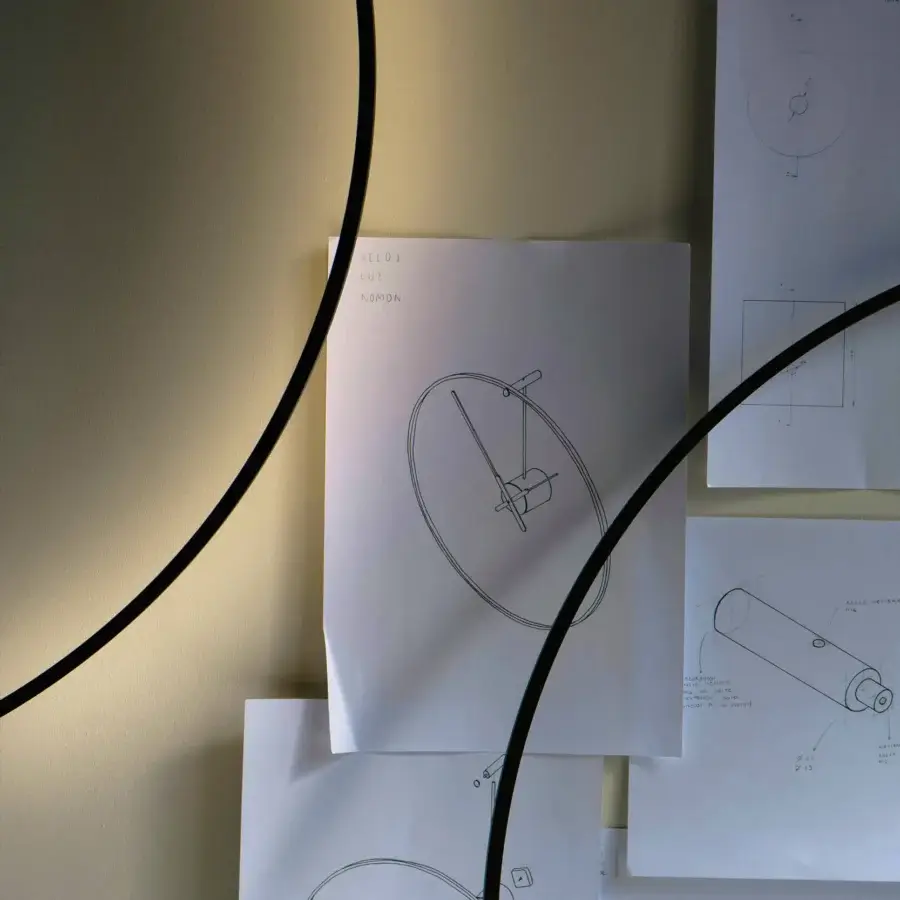 Superior Nomon Ombra clock lamp crafted in black anodized aluminum with integrated LED illumination