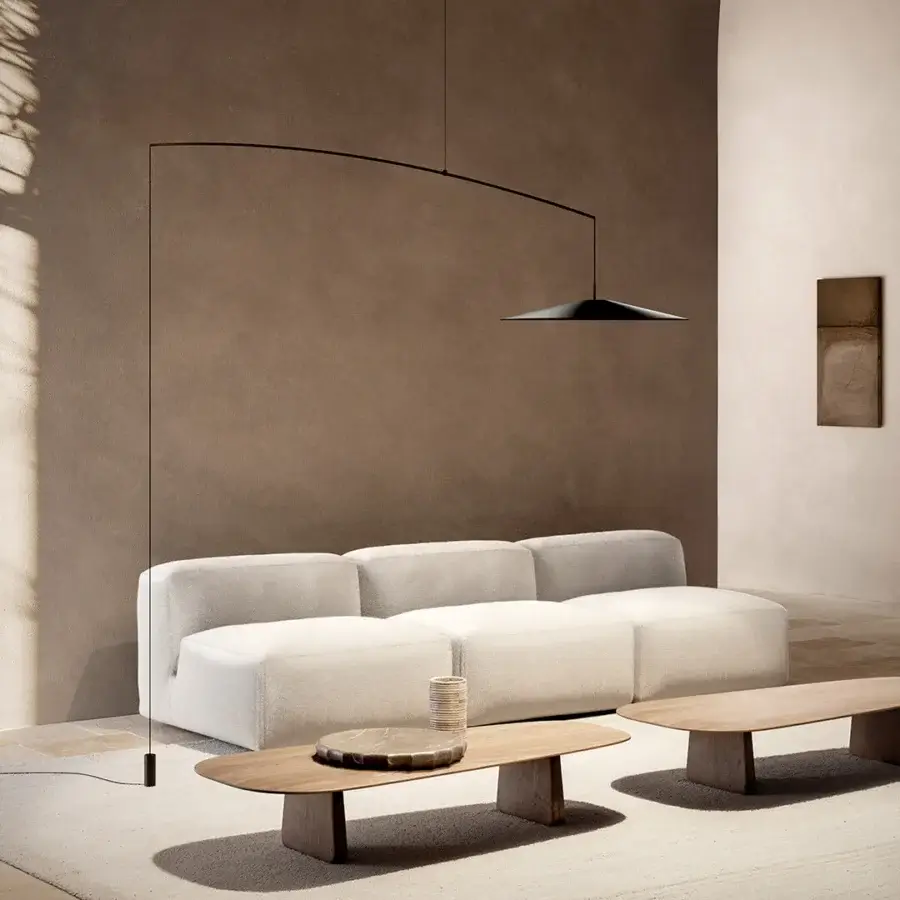 Elegant Luceplan Koinè floor lamp with aluminum structure, carbon stem, and glass lens in a matte black finish