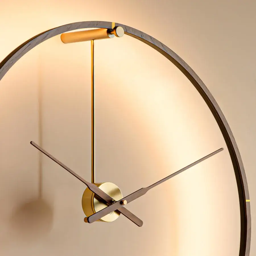 Distinguished Nomon Ombra Premium Clock Lamp crafted in dark satin-finished wood with warm gold-toned metal and integrated LED lighting