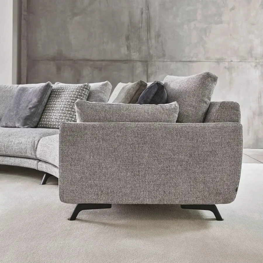 Exceptional Porada Étienne sofa with enveloping form and textured medium gray Microflock upholstery crafted with pewter grey metal feet
