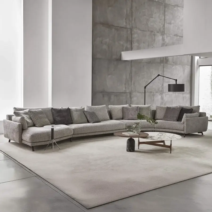 Exceptional Porada Étienne sofa with pewter grey metal feet, wooden inserts and light gray Microflock upholstery crafted for ergonomic comfort