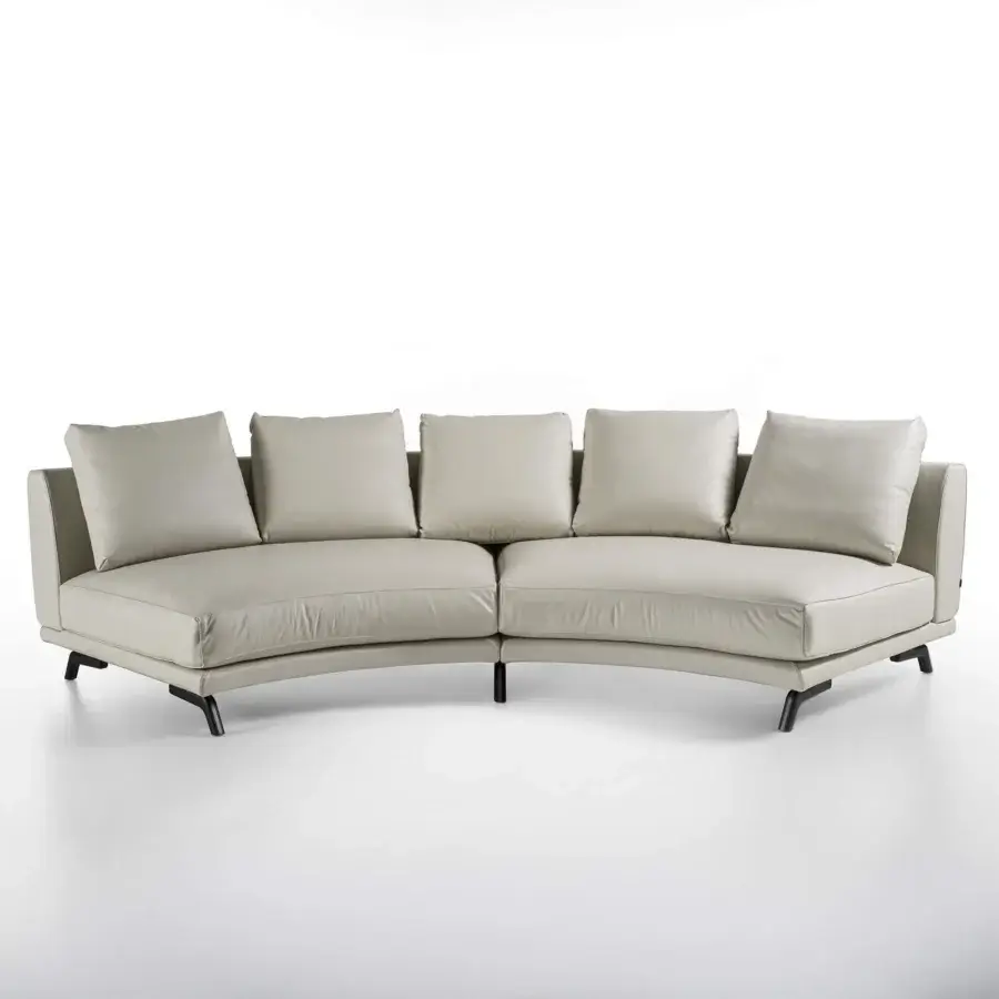 Lavish Porada Étienne sofa upholstered in pale beige leather with pewter grey metal feet and wooden inserts