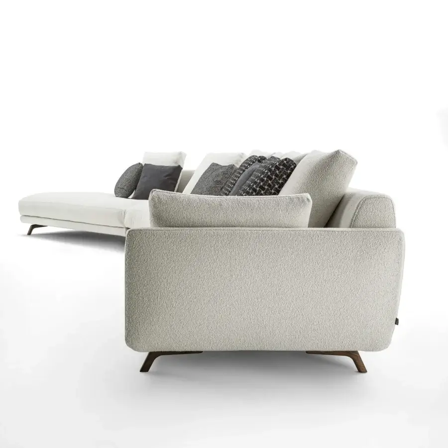 Lavish Porada Étienne sofa with textured light beige Microflock upholstery and pewter grey metal feet built with wooden inserts