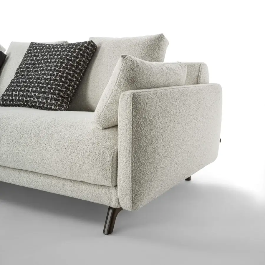 Superior Porada Étienne sofa with creamy off-white Microflock upholstery and pewter grey metal feet built with wooden inserts